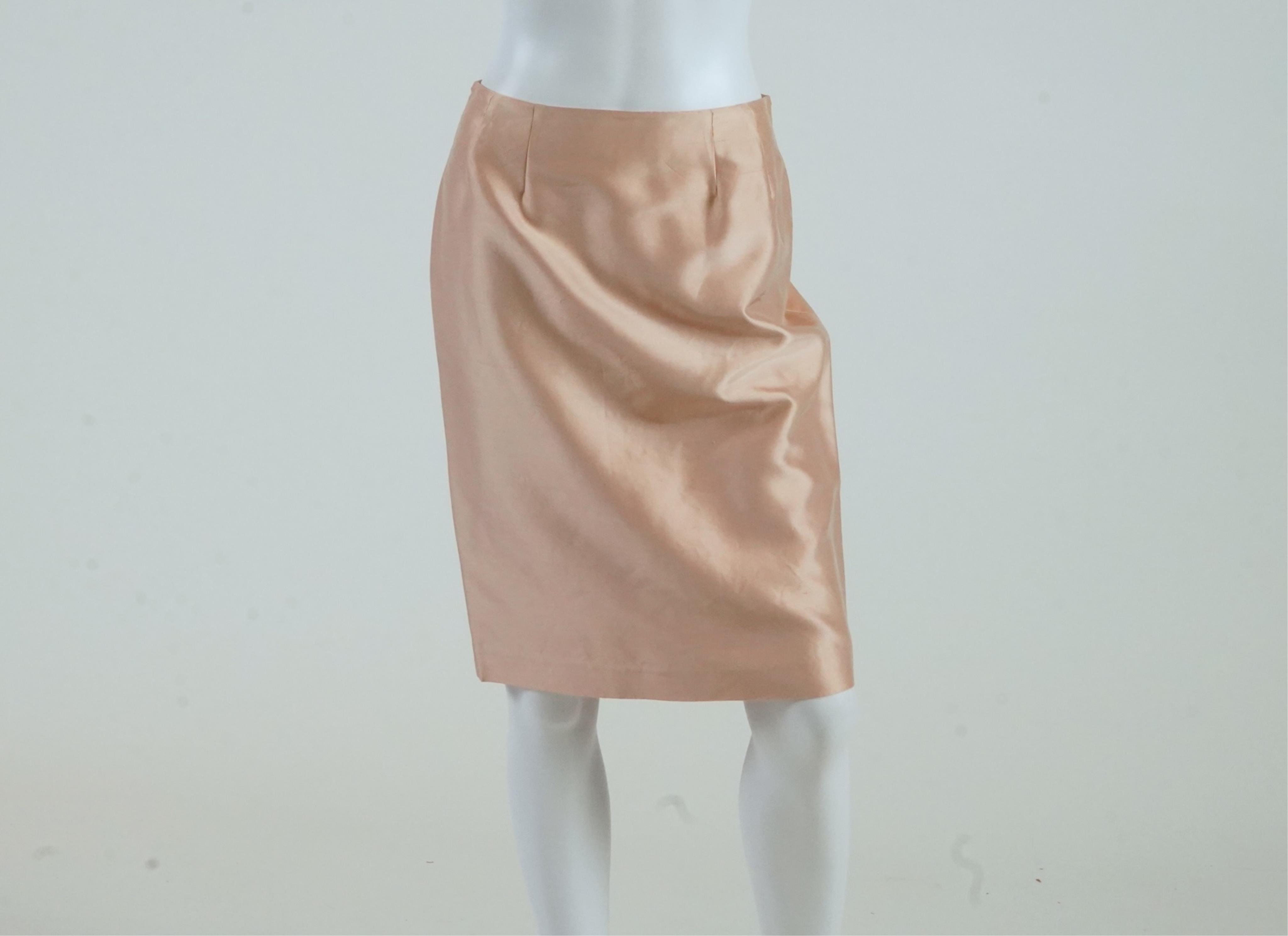 A Lea Rome grey skirt suit and a pale pink skirt